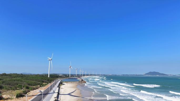航拍福建漳州东山岛海岸新能源风力发电