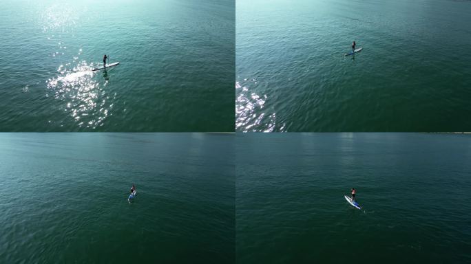 海上水面浆板运动划水航拍视频