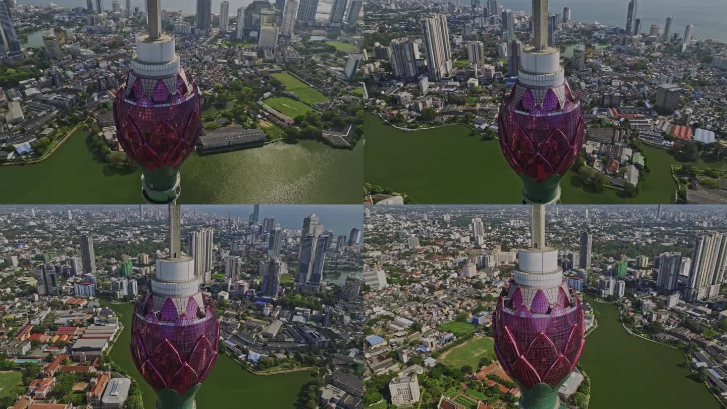 斯里兰卡科伦坡Aerial v2全景鸟瞰图无人机飞越贝拉湖周围的标志性建筑莲花塔捕捉市中心的城市景观