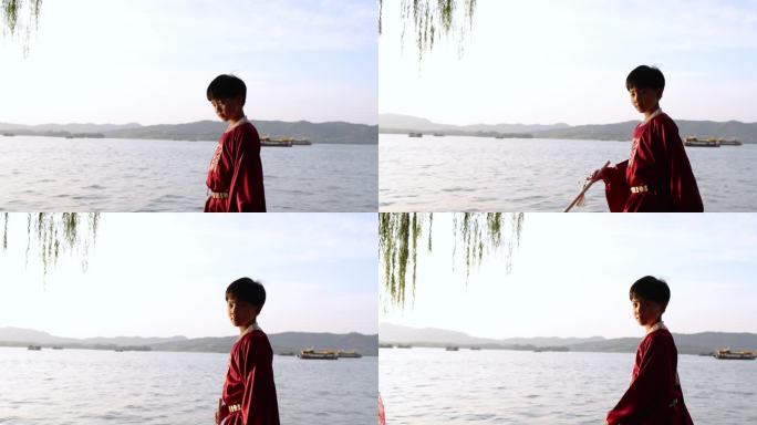 杭州西湖边穿汉服的男孩