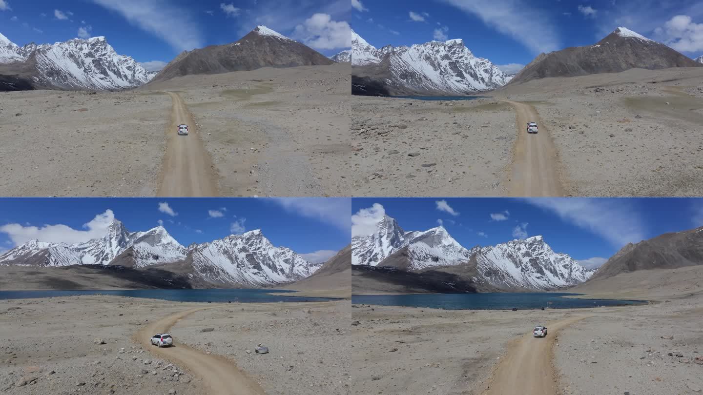 越野车开往西藏阿马直米雪山和定结宗措湖