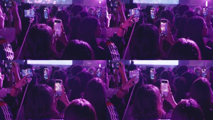 音乐节演唱会手机拍摄视频的歌迷