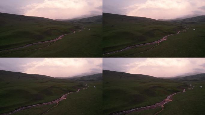 粉红紫色的落日在青山上