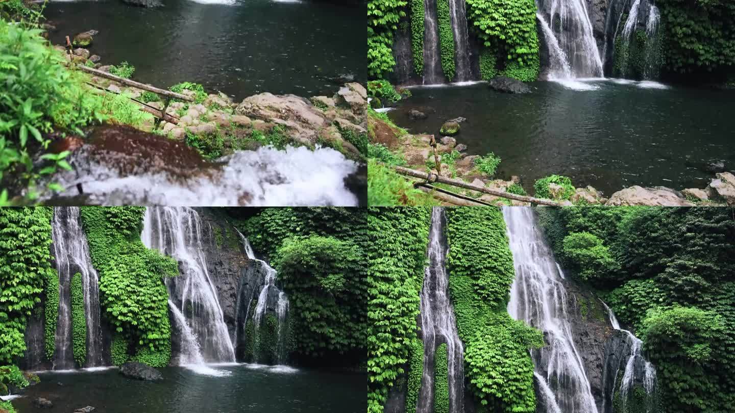 游览森林瀑布和池塘湿山的绿色自然。清晰的生态，生动的岩石林地或神奇的热带雨林在丛林海岸。色彩全景和瀑