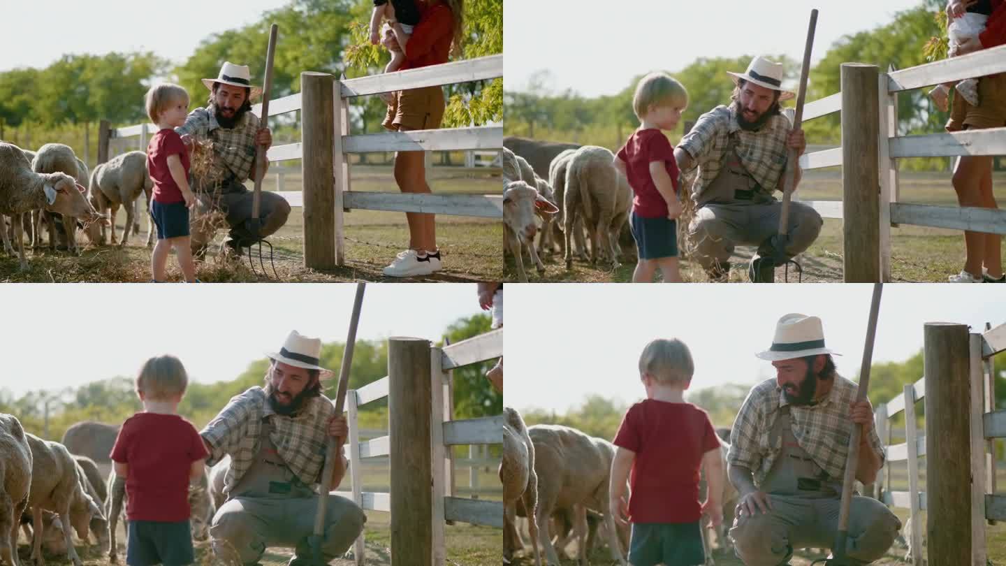 一家人带着小孩参观牧羊场，农场主在牧场上和一个三岁的男孩交谈