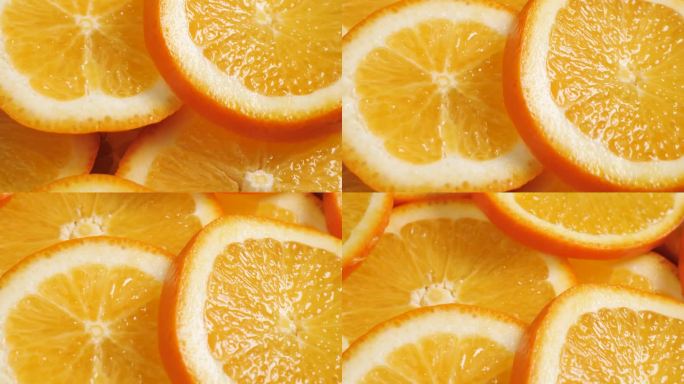 橙色水果。镜头慢慢向上平移，呈现出美丽多汁的橙子切片。微距镜头