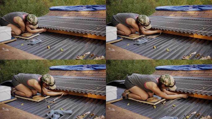 一名妇女将胶条贴在屋顶面板上的时间流逝