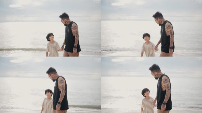 一个单身父亲牵着儿子的手走在沙滩上，他们一起度过了美好的家庭时光。