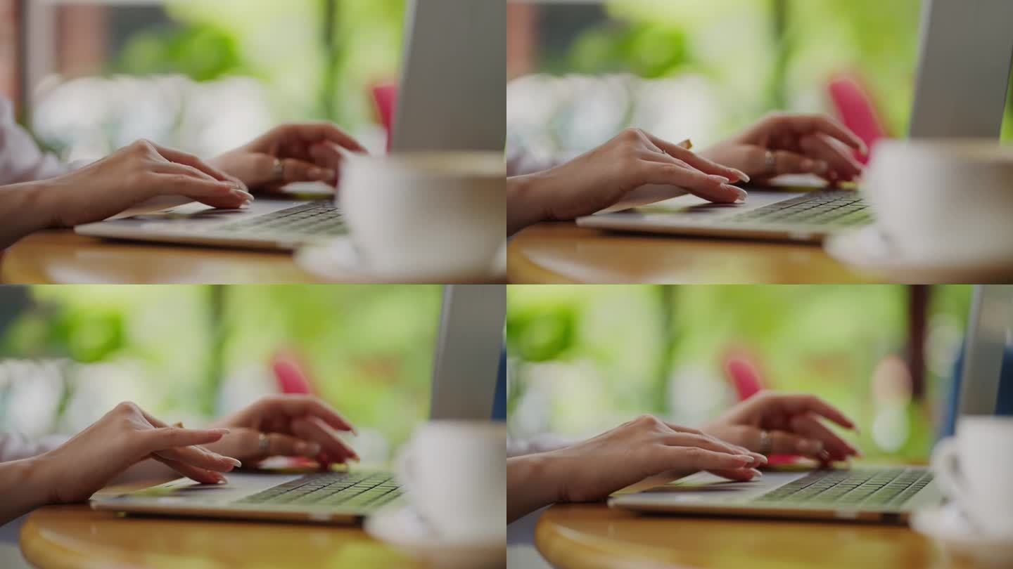 女商人在笔记本电脑键盘上打字，并使用触摸板，手的特写视图