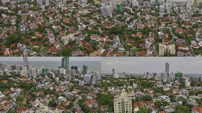 航拍v26鸟瞰图，飞越Bambalapitiya和Kollupitiya社区，捕捉高档住宅，倾斜显示