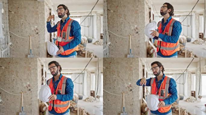 年轻的西班牙裔建筑师在建筑工地大汗淋漓