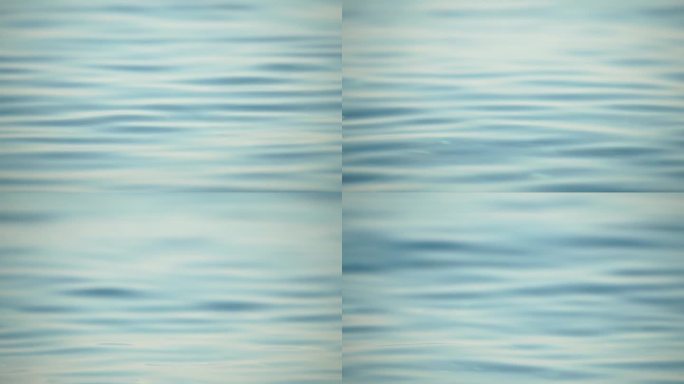 海水表面。镜头掠过平静湛蓝的海面。没有人。假日休闲概念。抽象航海夏季海洋自然。天气和气候变化。缓慢的