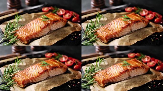 鲑鱼或鳟鱼片烤或烤或在烤箱里烤。健康海鲜，煮熟的红鱼，库存视频4k素材。