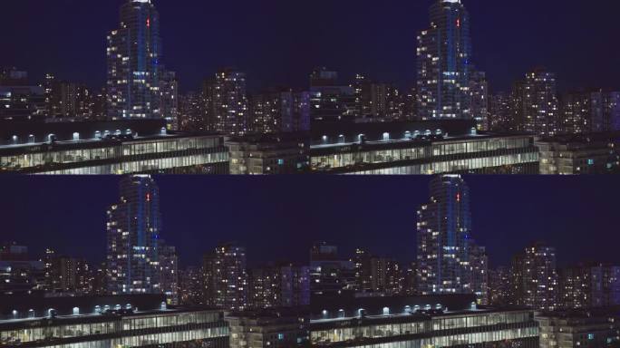 温哥华的夜晚。光线透过公寓的窗户照进来。