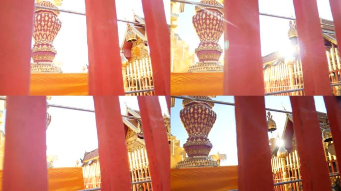 在泰国清迈的素贴寺，佛教徒在阳光下将他们的愿望写在金钟上，挂在寺庙的栅栏上。清迈著名的旅游景点景点地