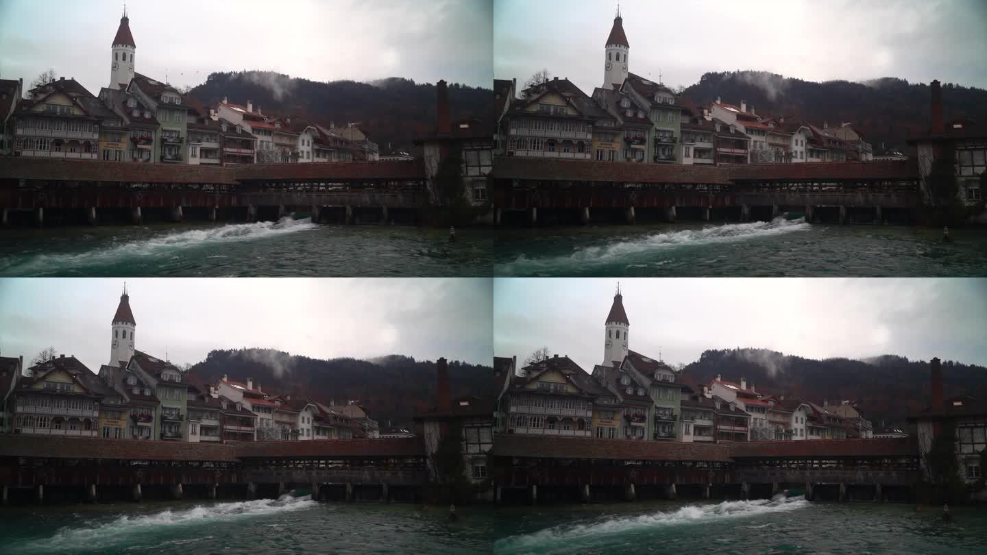 电影图恩河冲浪多云市中心历史悠久的瑞士瑞士小镇城堡施洛斯堡因特拉肯图恩湖宁静的锁冬天鸟飞三脚架仍然