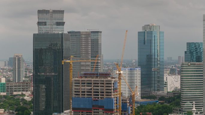 白天雅加达市中心建筑屋顶全景4k延时拍摄印度尼西亚