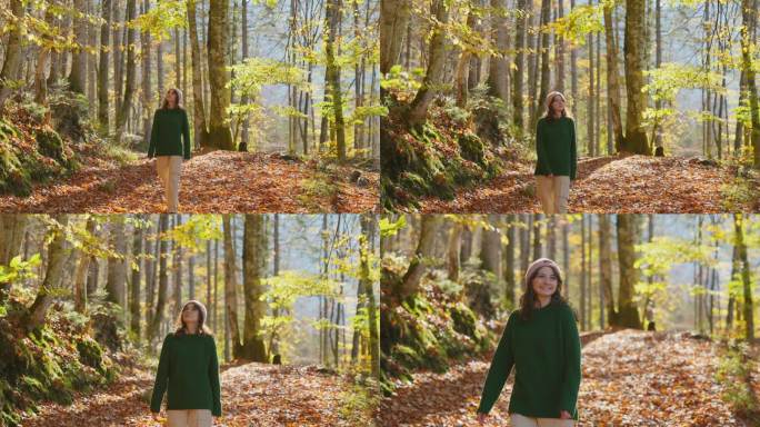 秋天，穿绿毛衣的女人走在森林里