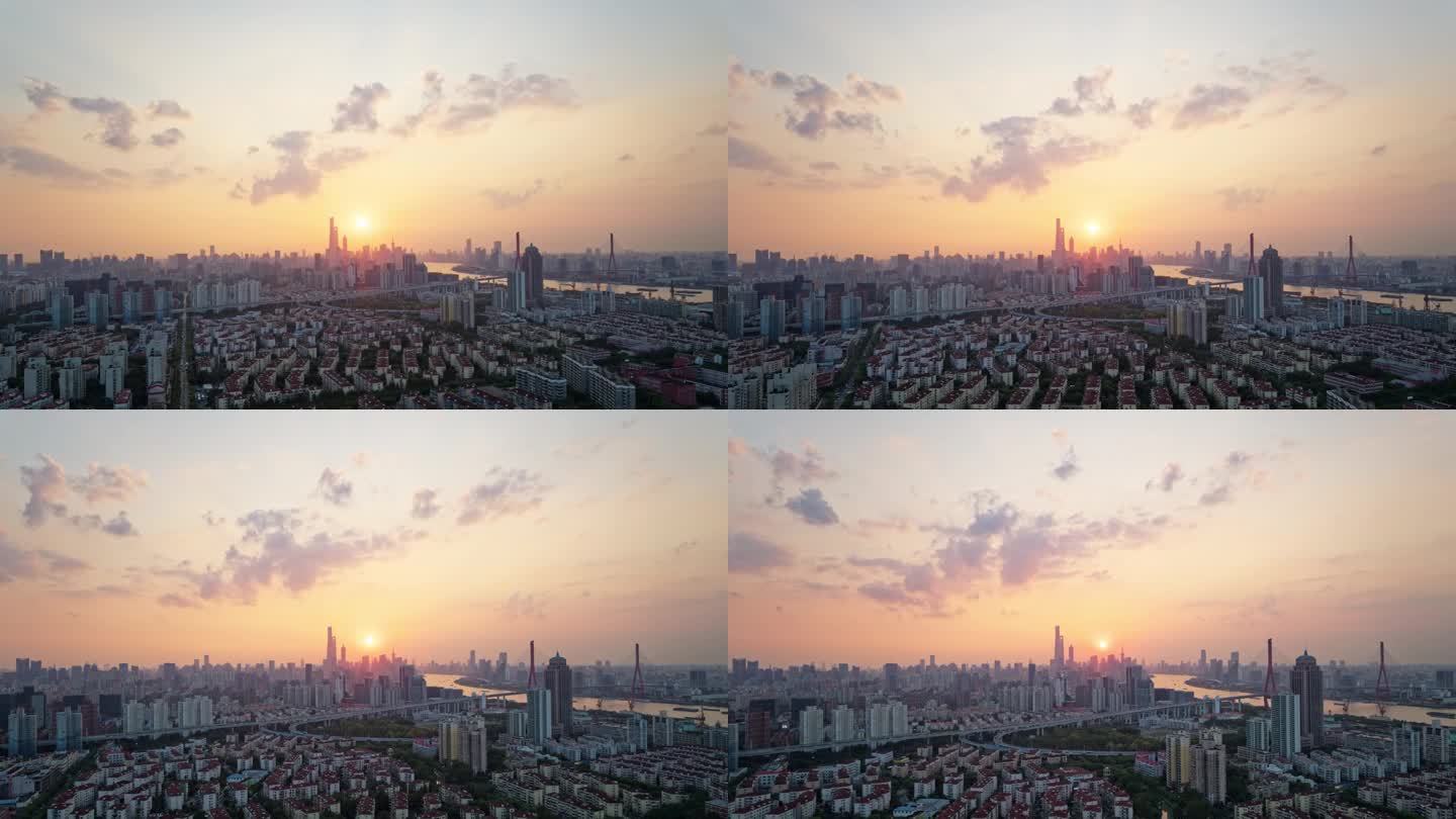 高角度的上海城市在惊人的晚霞，4k延时镜头航拍无人机视图。
