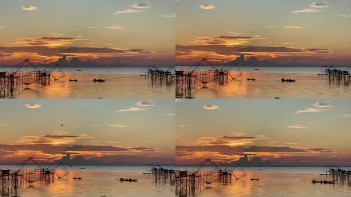 泰国帕塔隆Pakpra村的日落，船和大鱼笼