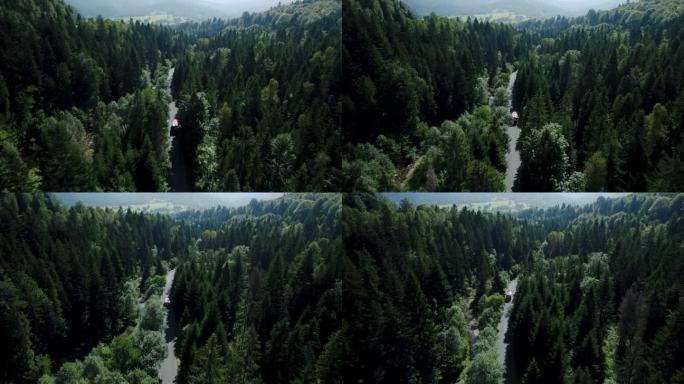 4k无人机拍摄的消防车驾驶在令人惊叹的森林景观风景