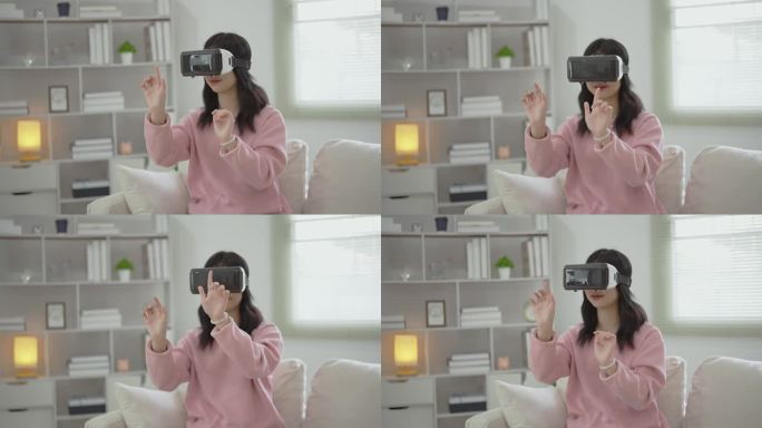 亚洲女人微笑着玩VR游戏，3D眼镜在家里客厅娱乐，亚洲女人在家里度假快乐。快乐女人玩虚拟现实技术概念