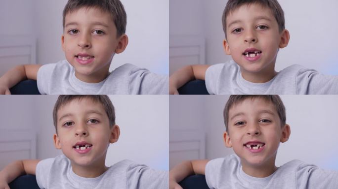 近口小孩掉了一颗乳牙。更换恒换牙、无牙微笑、牙龈破洞。儿童牙科概念。男孩穿着一件灰色t恤，对着镜头微