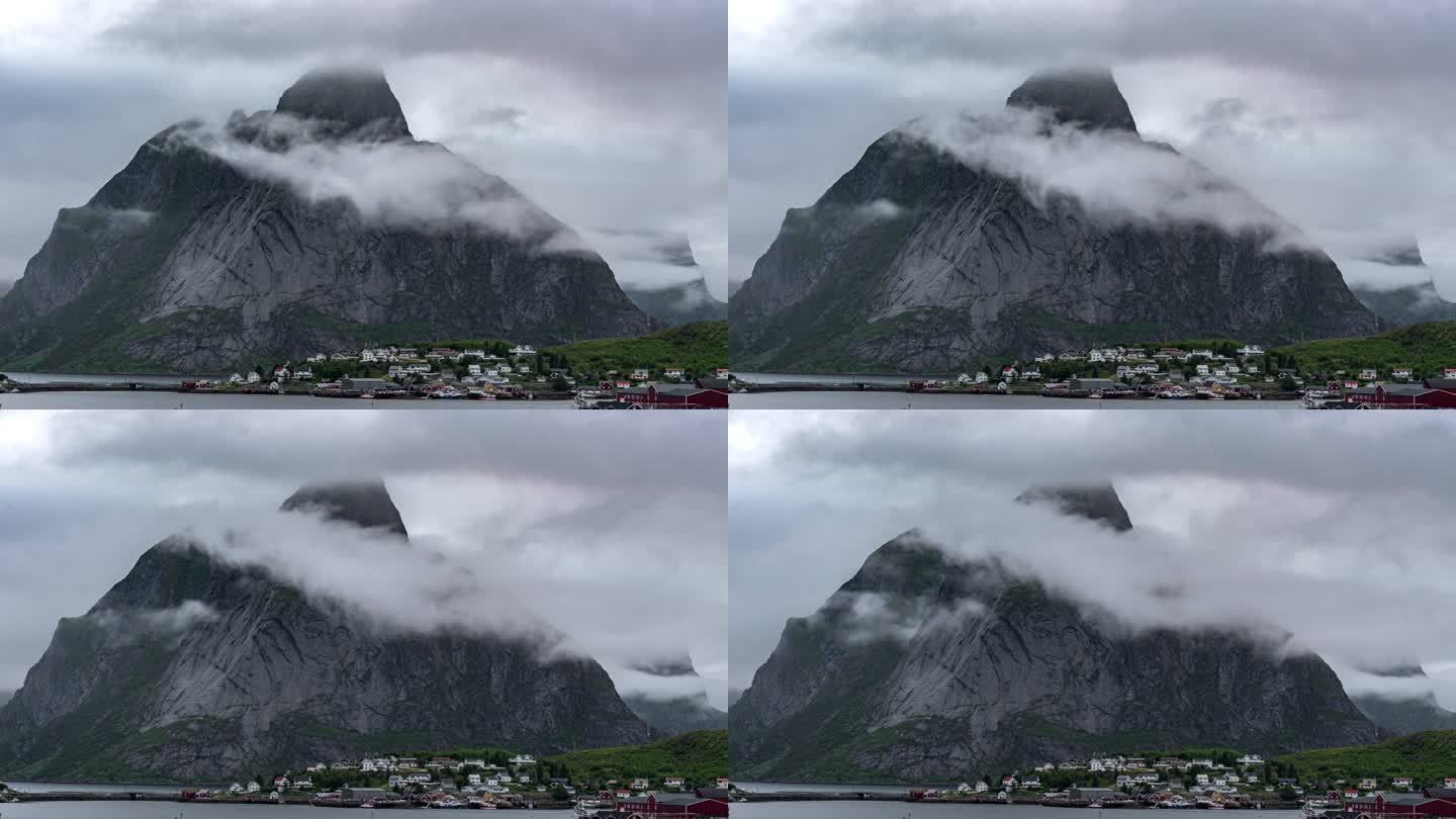 挪威莱因渔村和云雾缭绕的石山峰顶。时间流逝