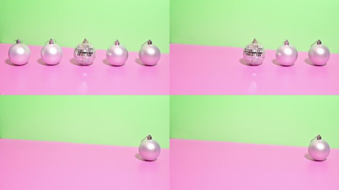 银色魔法:银饰出现和消失在一个柔和的绿色和粉红色的背景