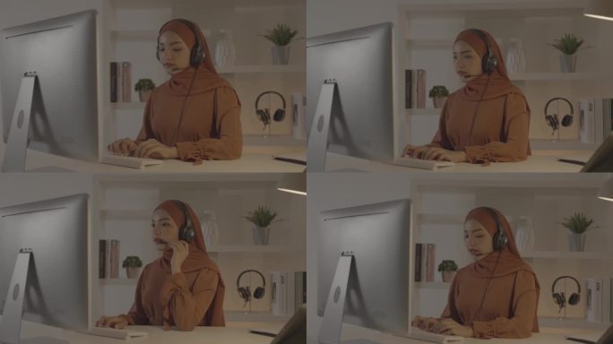 穆斯林女商人在家办公。女人用笔记本电脑，人们宗教伊斯兰生活方式的概念。