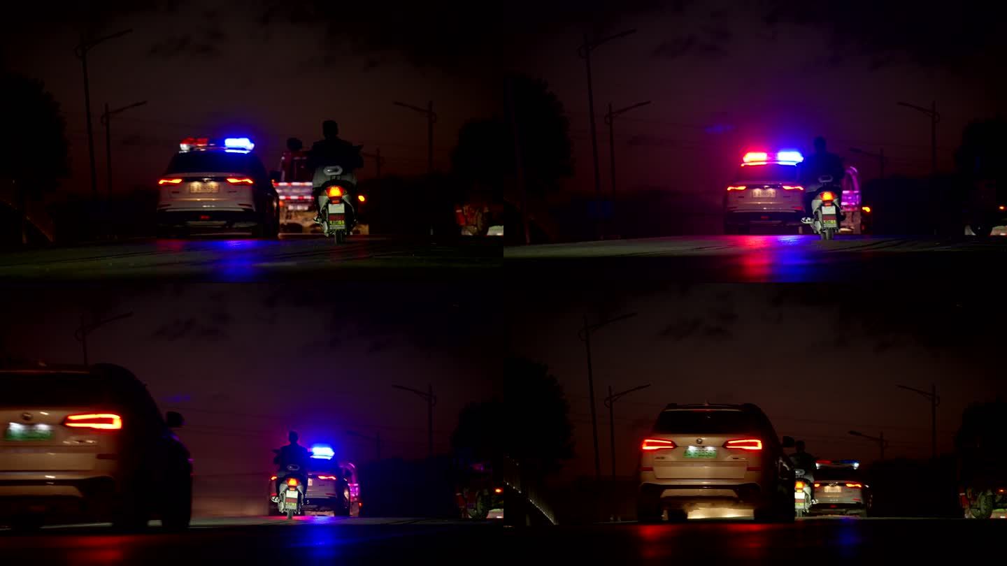 晚上一辆警车闪着警灯向前方驶去