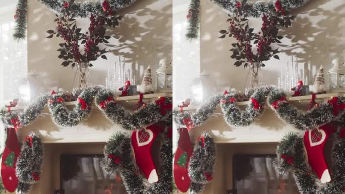 垂直屏幕:和平的雪圣诞节早晨:空镜头装饰的角落在现代的房子与圣诞树，壁炉和礼物。一个家庭庆祝节日的家