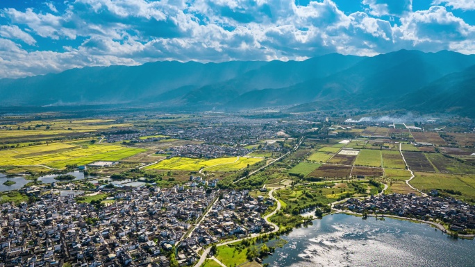 云南大理喜洲古镇航拍云层丁达尔风光