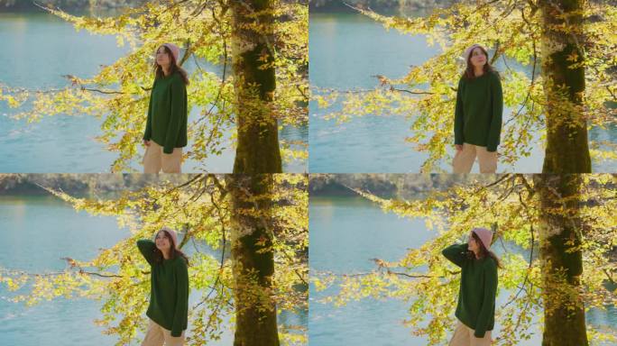 在奥地利的秋天，一名女子在湖边散步