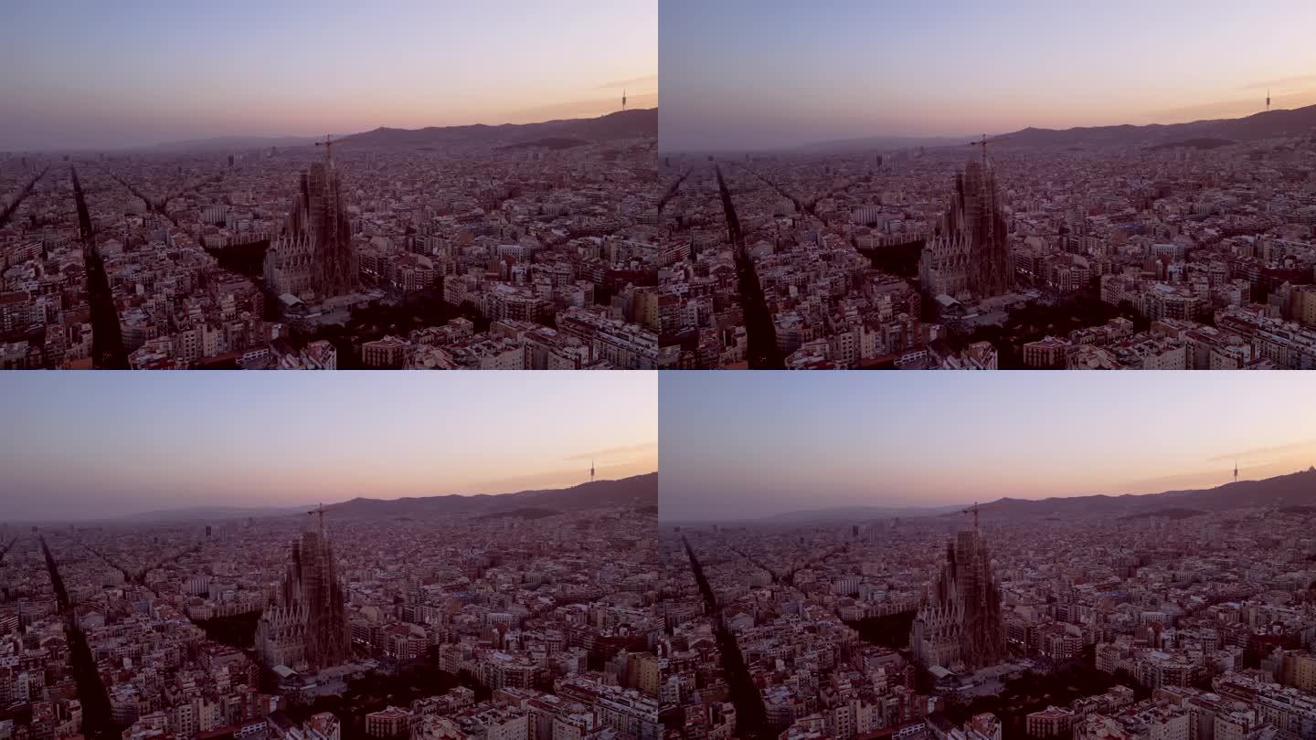 空中无人机拍摄的巴塞罗那城市景观，包括圣家堂标志性塔。