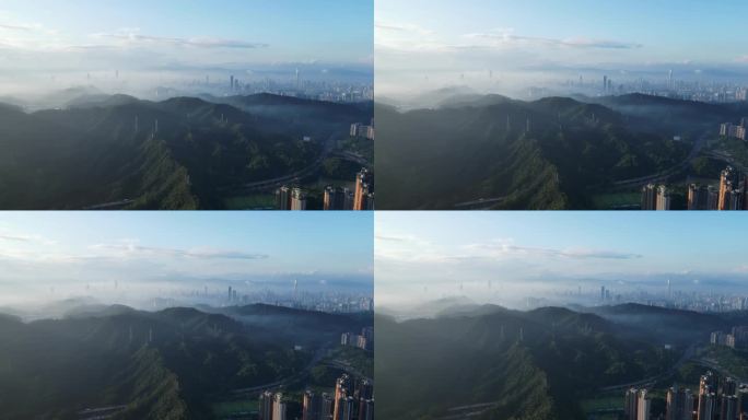 深圳银湖山沿山公路与远处市区晨雾