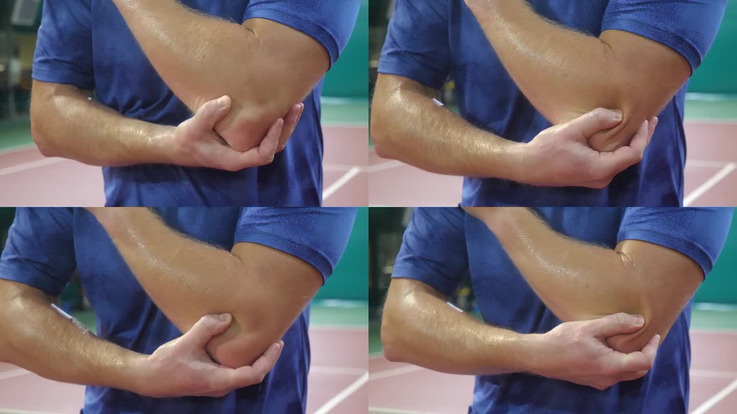 一个年轻人在硬地网球赛中肘部受了伤。