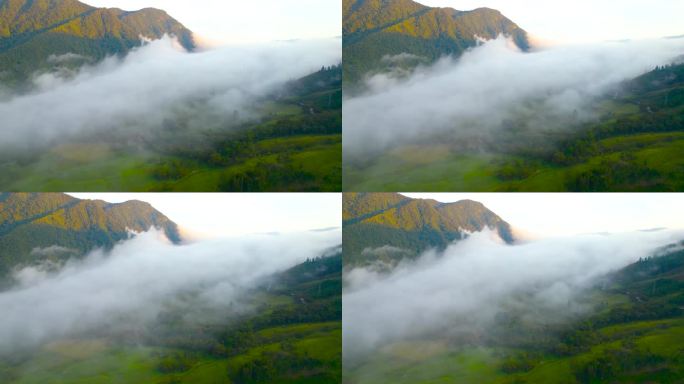 秘鲁奥萨帕帕的早晨，这是无人机高角度拍摄的画面。一个缓慢的，电影般的旋转围绕着云层揭示了被云层覆盖的