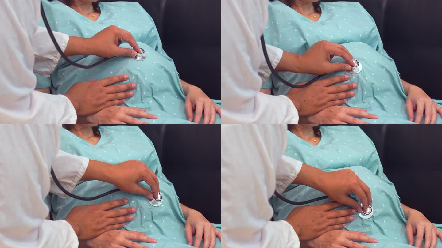 一名男医生在妇产中心会诊期间检查他怀孕的病人。