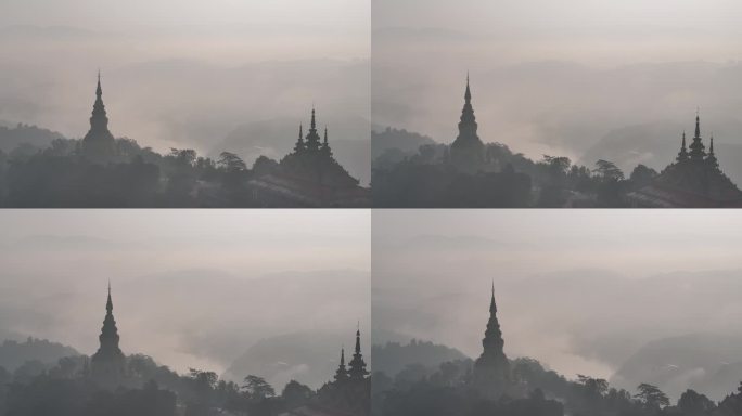 中缅边境线上的佛塔沐浴在晨雾中