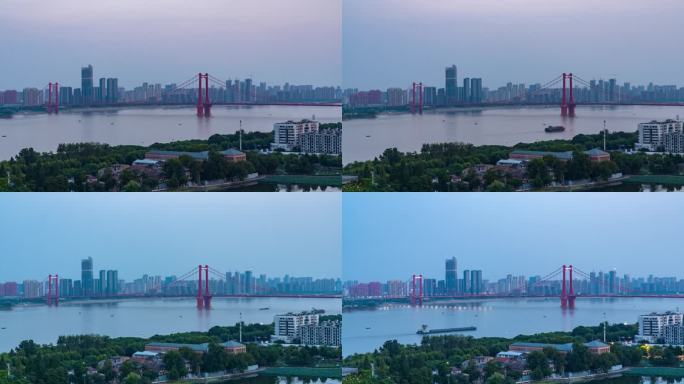 湖北省武汉市鹦鹉洲大桥日转夜延时摄影