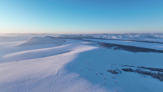 寒冬丘陵雪野风光