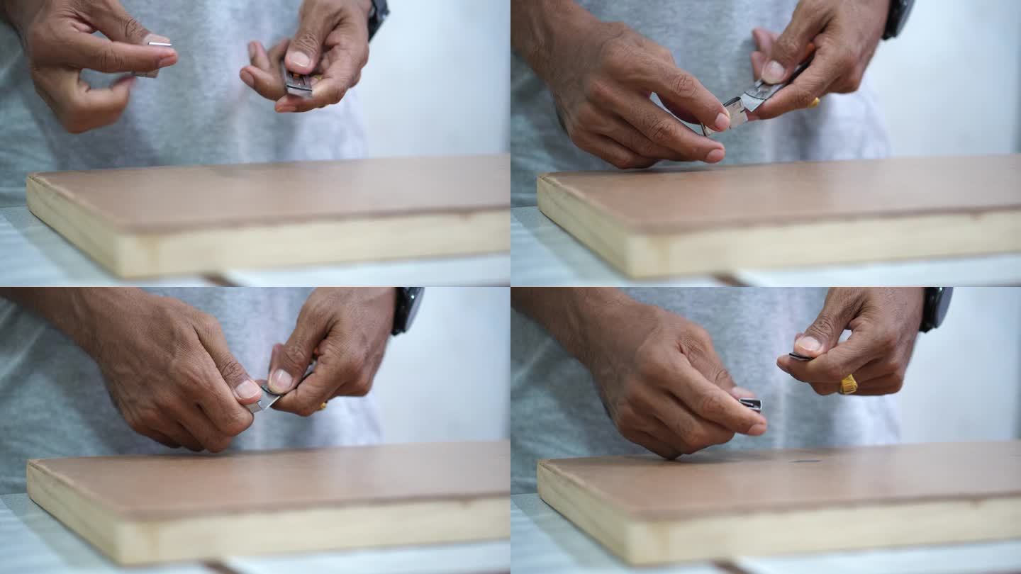 在粘贴到胶合板上之前，专业技术人员用切刀装饰纸张的边缘