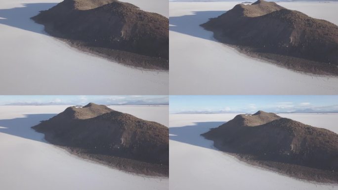 无人机拍摄的乌尤尼盐湖周围的佩斯卡多岛，鱼岛，在世界上最大的盐滩在玻利维亚安第斯山脉的高海拔地区。