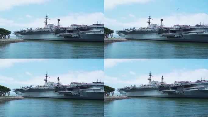 美国军用登陆舰与无线电塔停靠在港口
