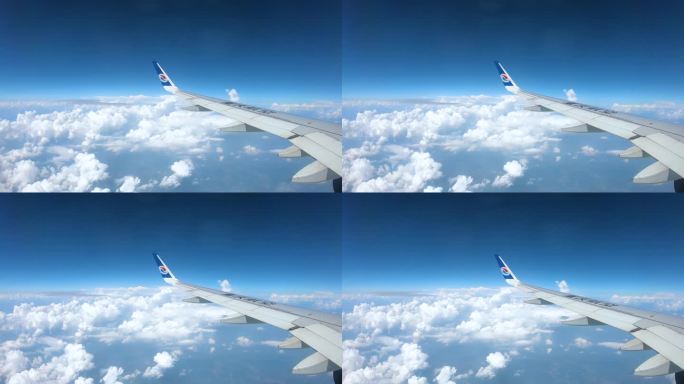 飞机在蓝天白云中飞行