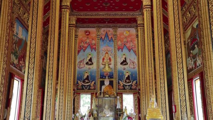 美丽的白色佛像和泰国寺庙大教堂的墙壁艺术