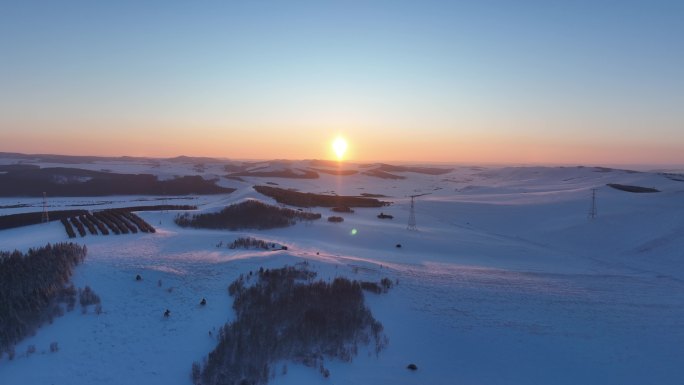 冬天呼伦贝尔丘陵地带夕阳雪景