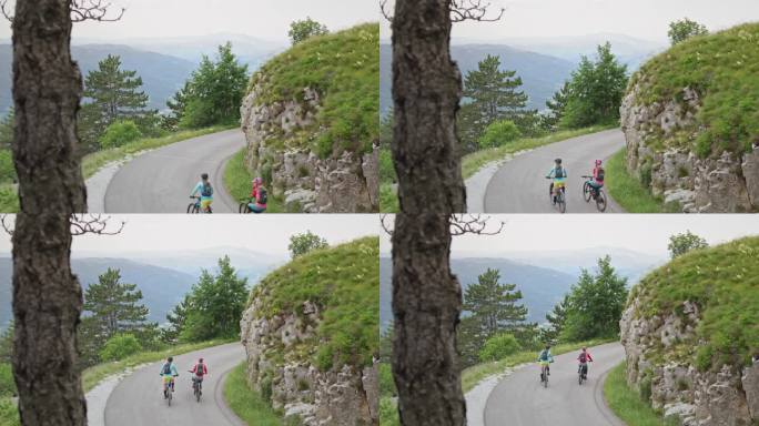 lh:两个女山地车手骑着自行车上了山路