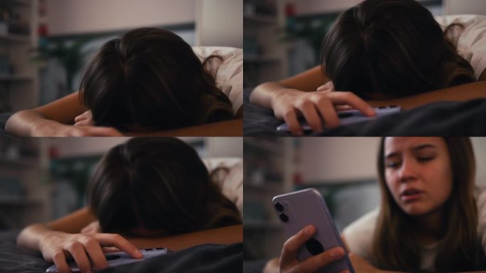 沮丧的少女躺在家里的床上看手机